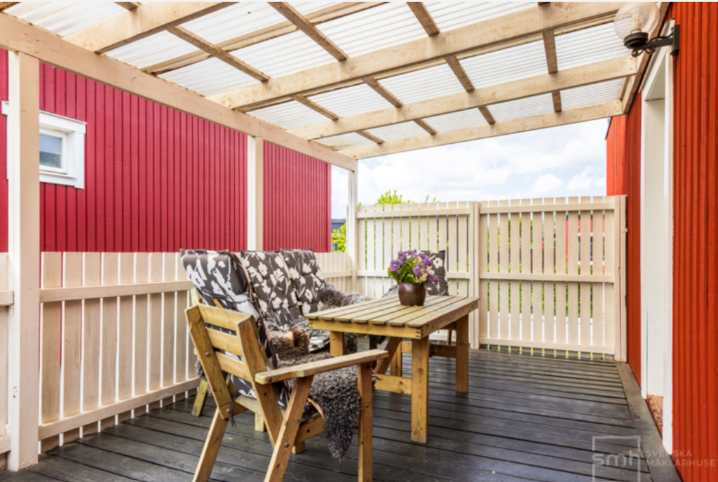 Terrace with roof. We now have a table and chairs to enjoy meals outside.