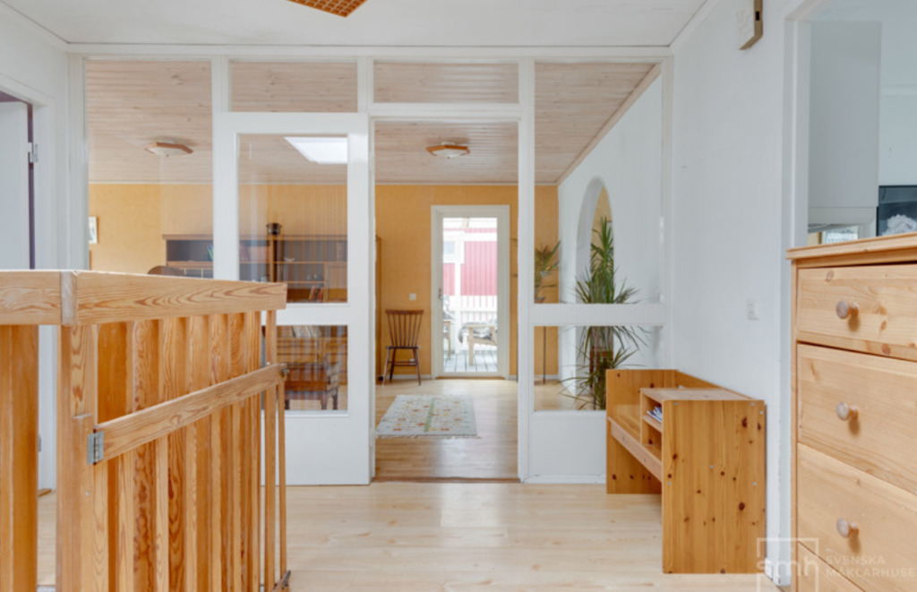 Upstairs, glass doors to the living room and access to the terrace