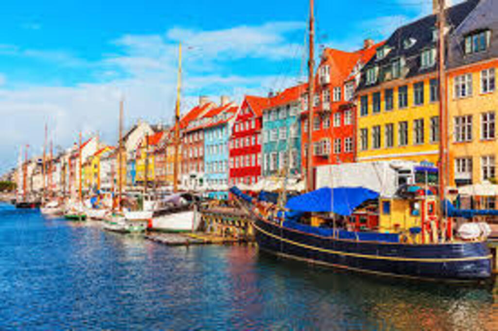 Nyhavn, most iconic, picturesque and beloved tourist destination in Copenhagen. Originally a 17th-century world wide commerci...