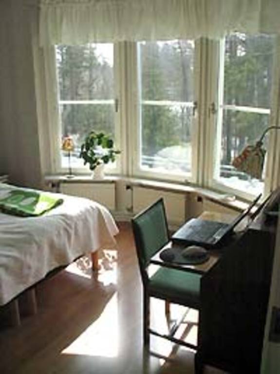 2nd floor bedroom, view over pine and fir woodland
