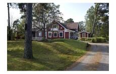 The house is located on a large wooded peninsula, right on the Baltic Sea.
