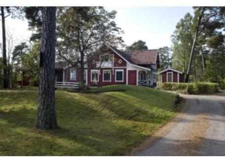 The house is located on a large wooded peninsula, right on the Baltic Sea.
