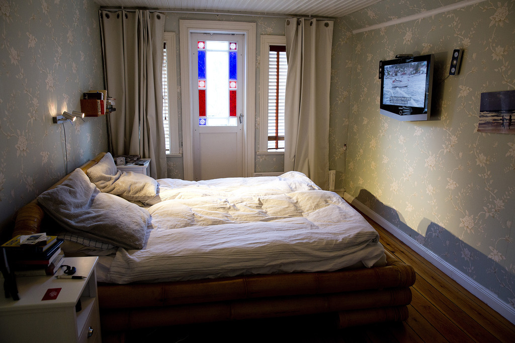 Bedroom upstairs with balcony.