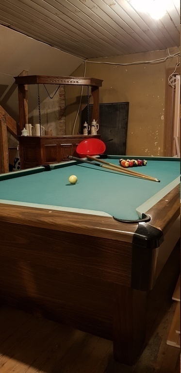 Pub with pooltable and dartboard