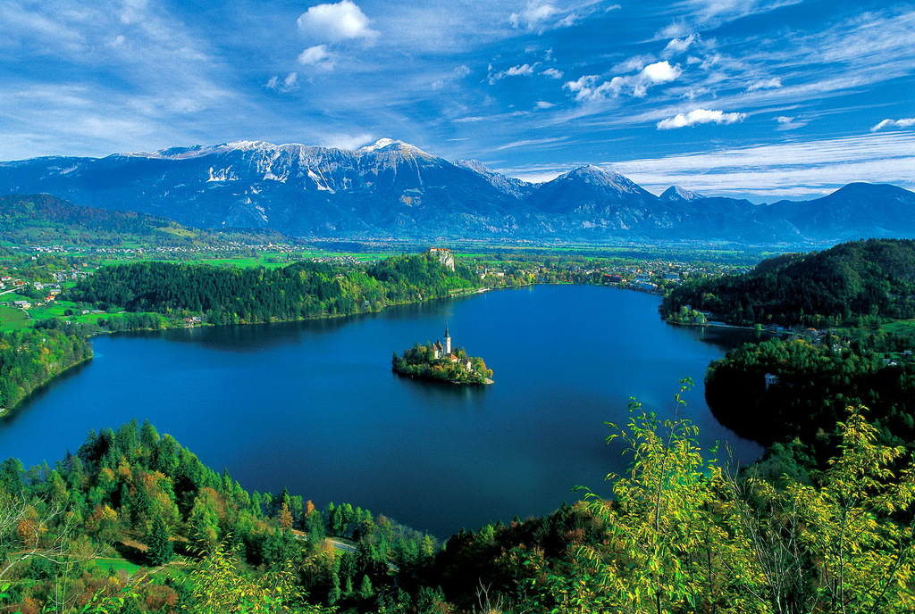 Lake Bled with its famous island and castle on a rock just next to the lake.