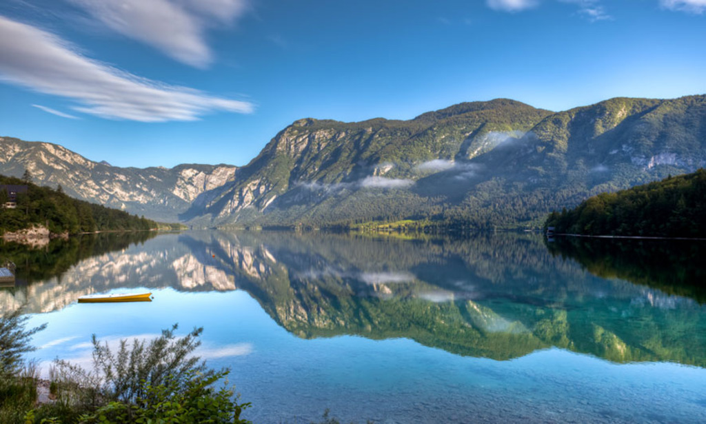 Lake Bohinj with its stunning surroundings and crystal clear water. You can also take a cable car to Vogel and admire the lak...