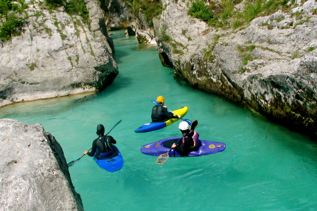 Kayaking on river Soča.