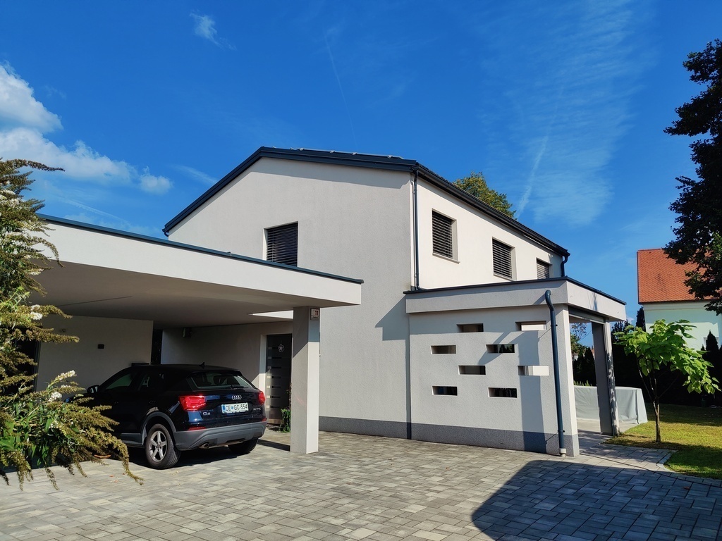 Our home with a carport