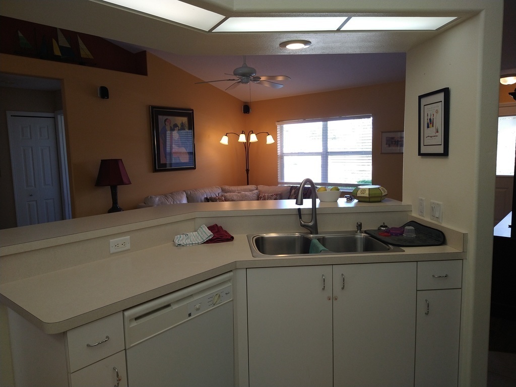 Kitchen looking out into living area