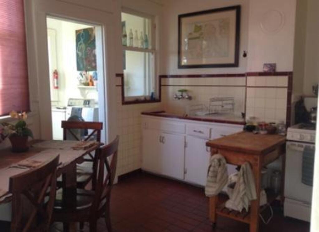 eat-in kitchen and shared laundry room