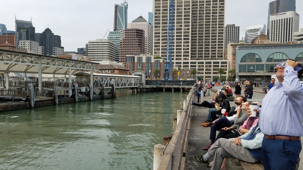 People watching a solar eclipse from the ferry building, a 1.2-mile walk from my flat.