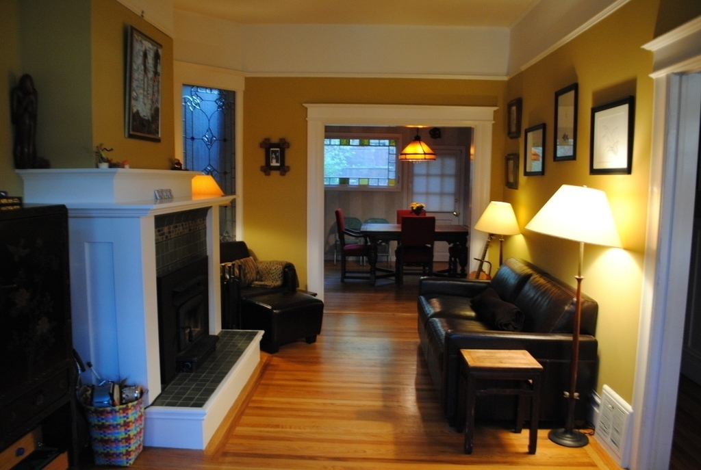 living room to dining, wood burning fireplace