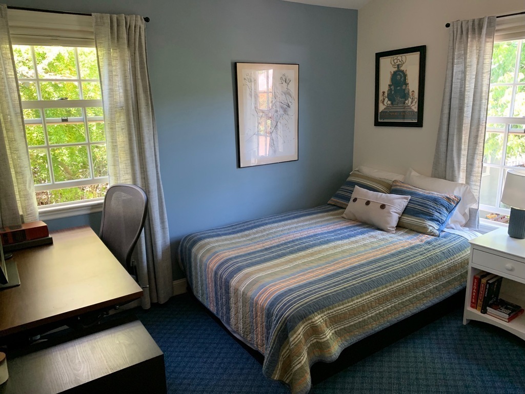 The third bedroom with a queen sized bed