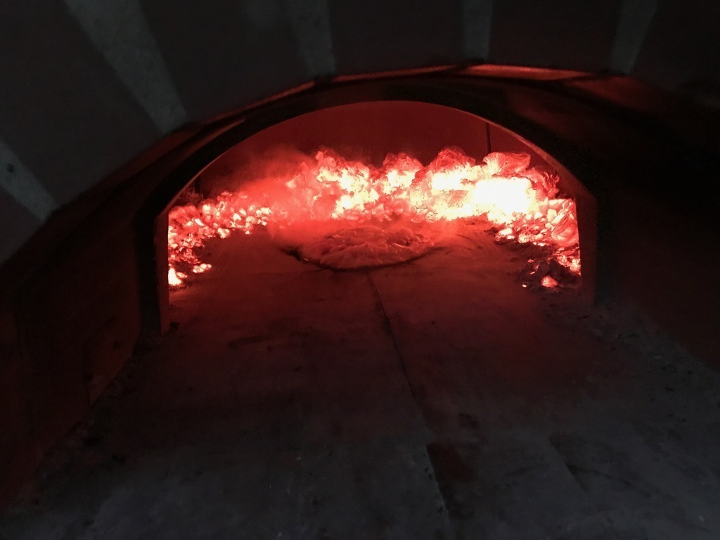 Our wood fired oven cooking pizza
