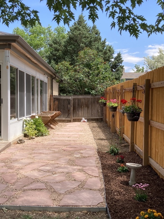 Vegetable/flower garden adjacent to sunroom