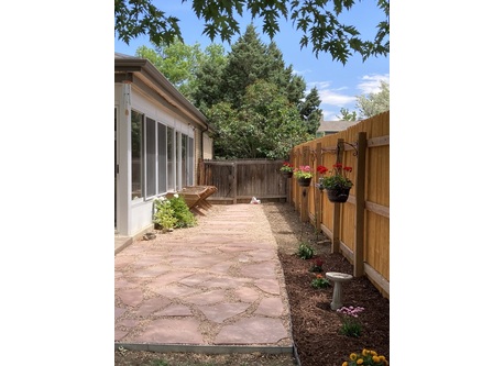 Vegetable/flower garden adjacent to sunroom