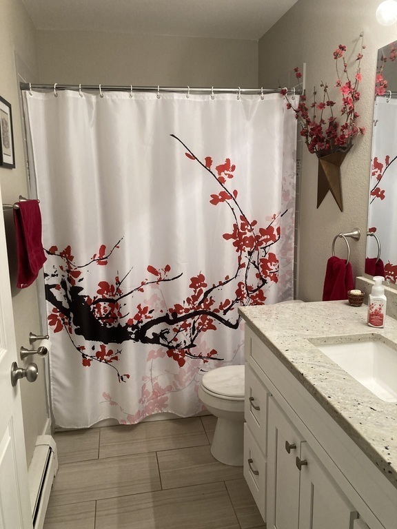Main floor bathroom with bathtub/shower