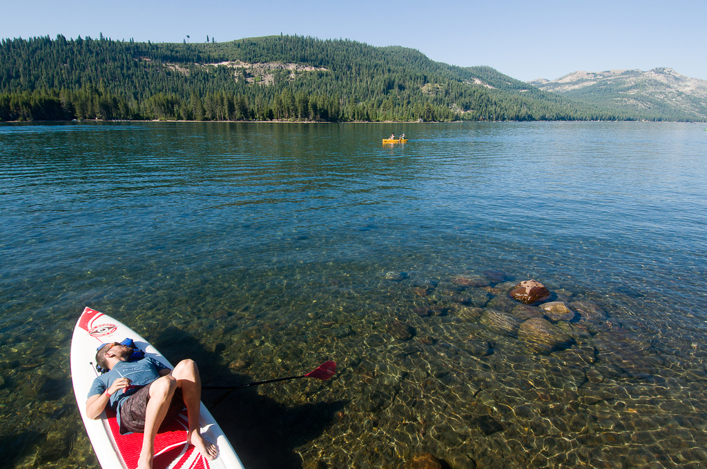 Recreation on clear mountain lake