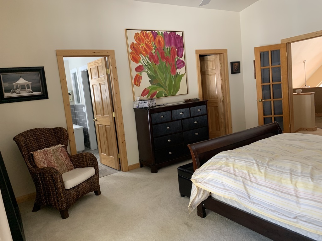 Master bedroom looking into bathroom