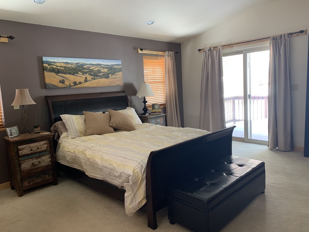 Master bedroom with queen bed