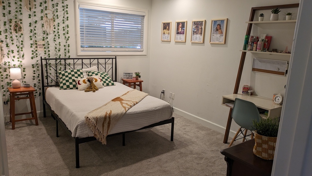 Our daughter's bedroom. Full size bed, desk, dresser and mirrored closet.