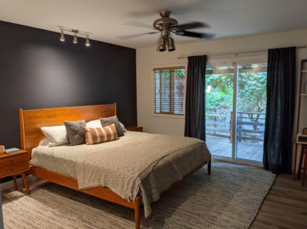 Master bedroom with sliding doors to deck. 