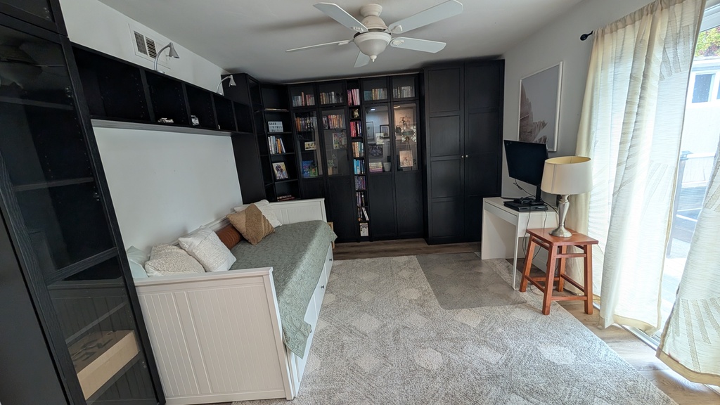 Guest room with pull out IKEA trundle. And lots of books!