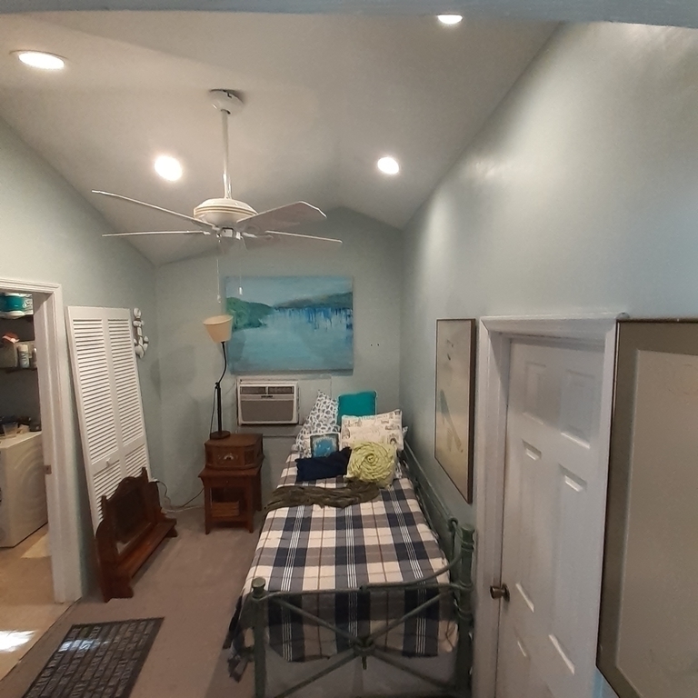 The small bedroom is adjacent to second bathroom, which has access to the backyard/pool.