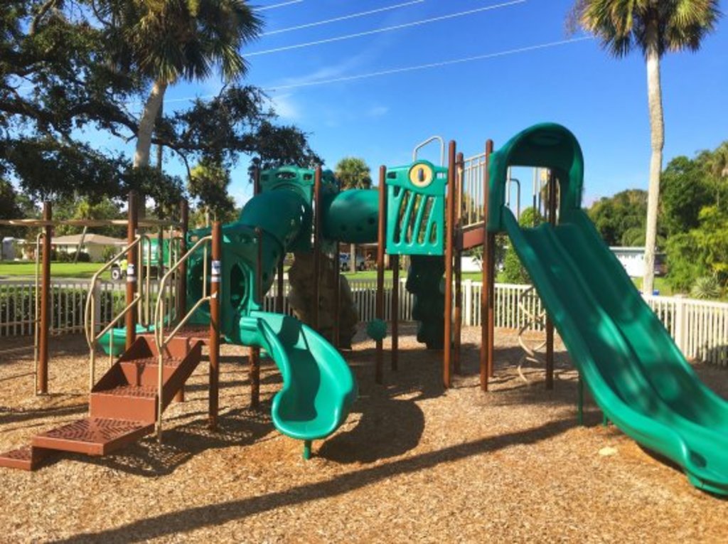 Children's Playground at the park directly in front of our home, with a river viewing pier.