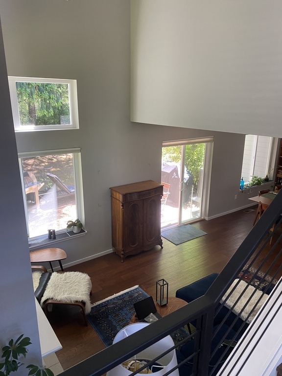 view from living room through windows to patio