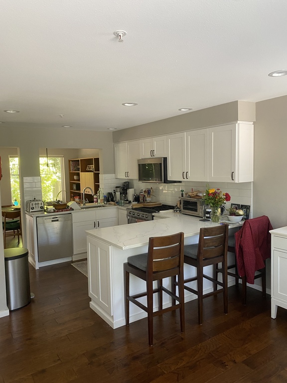 full kitchen, coffee maker, dish washer gas range, and microwave