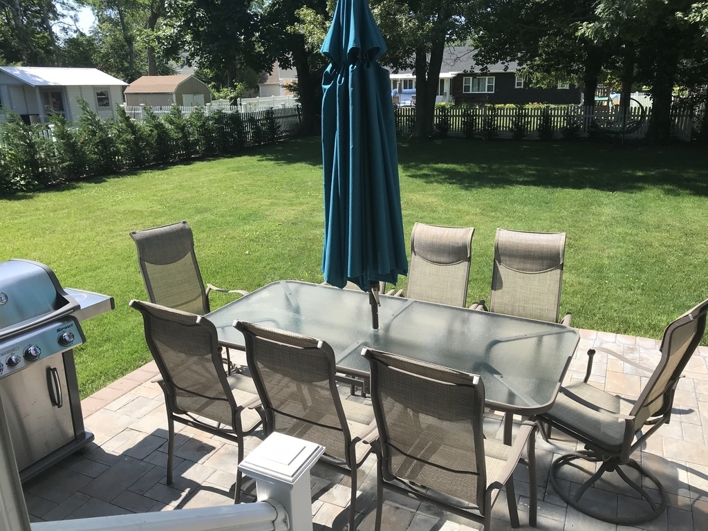 back garden with hammock and BBQ