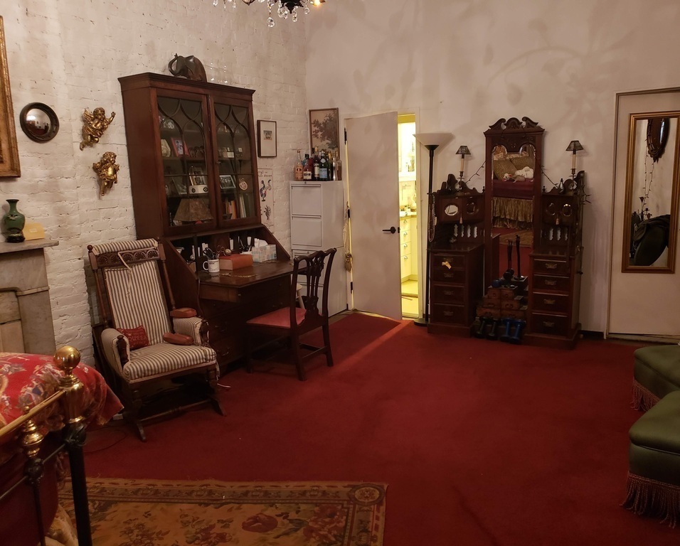 Bedroom looking back at kitchen