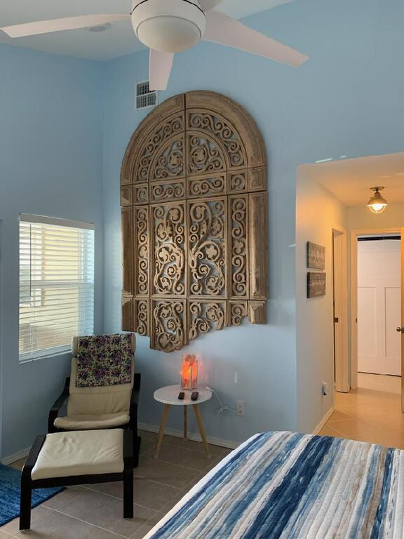 Primary bedroom with view of the water