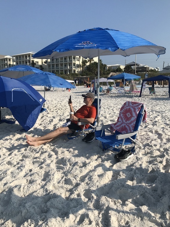 Enjoy an early morning coffee on the sandy white beach.