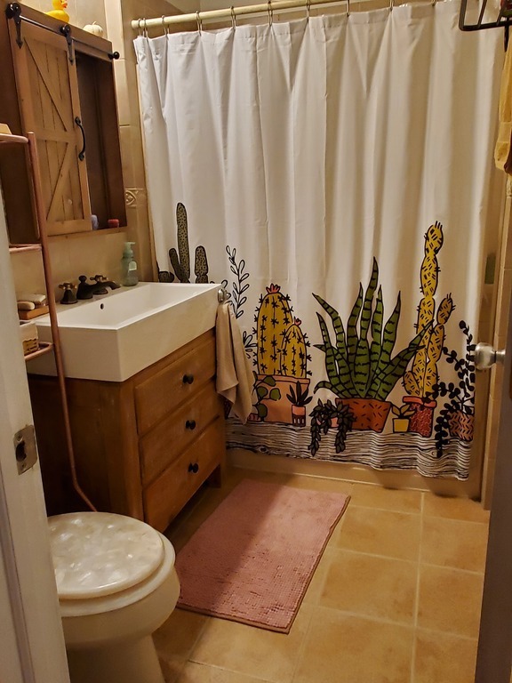 Bathroom on main floor, with tub