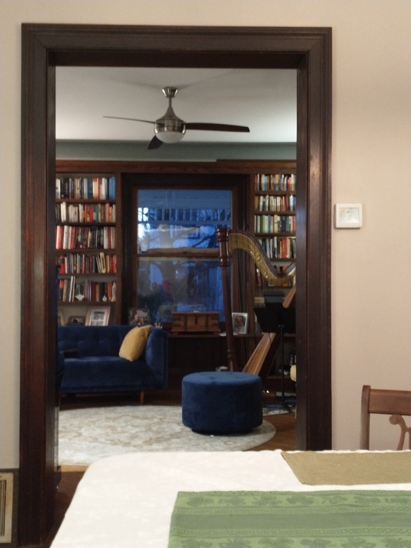 View into Living room, where you are welcome to use our home library