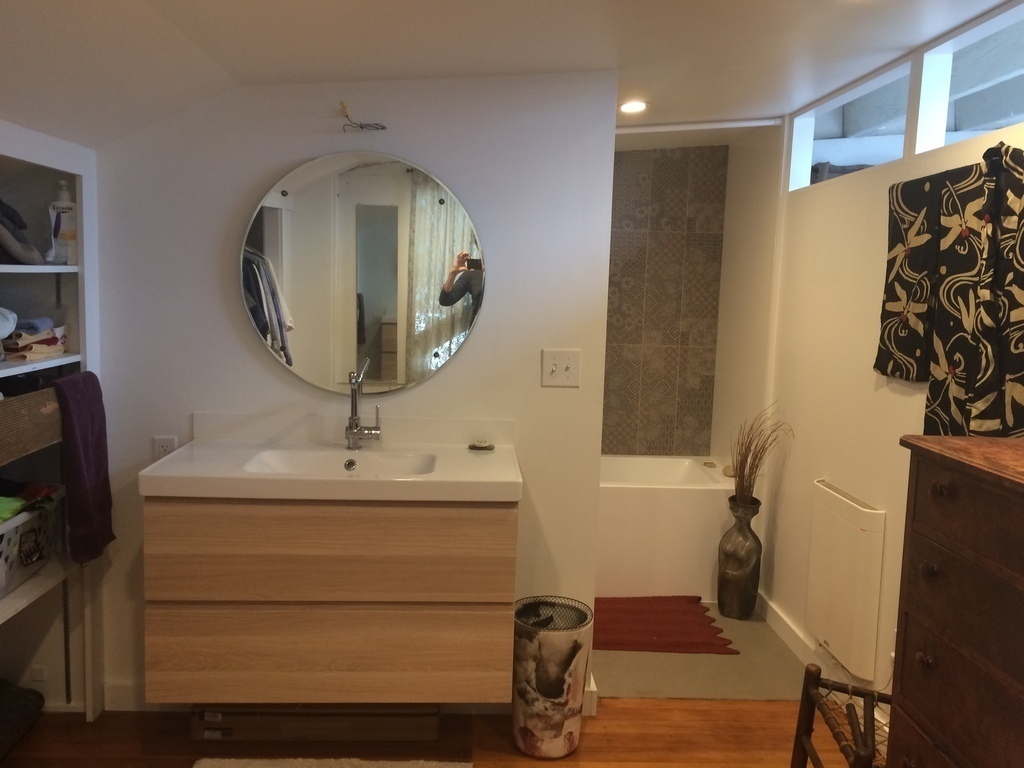 Master bath, tub, and dressing room