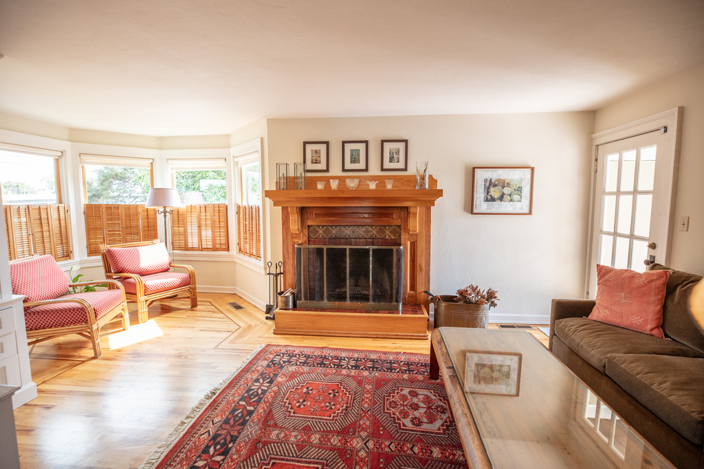 Living room with fireplace and tv