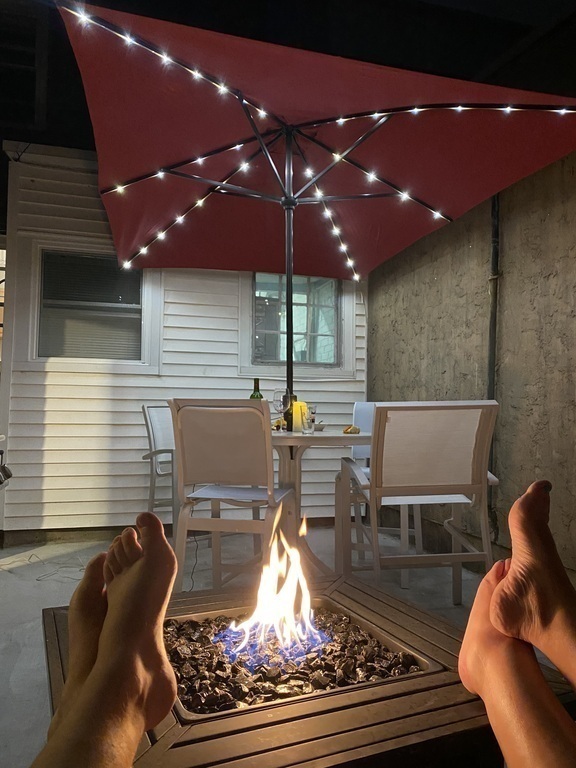 Enjoying the gas fire pit in our backyard 