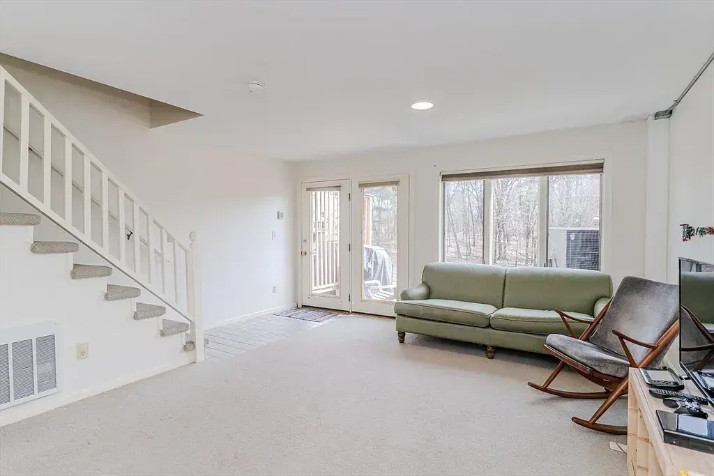 Basement area for hanging out or barbequing on the back deck
