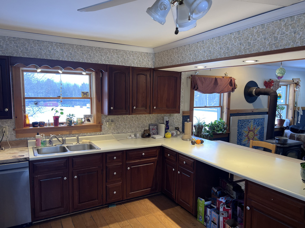 Kitchen and Living Room are one Great Room with Bar between.  Windows to North field. 