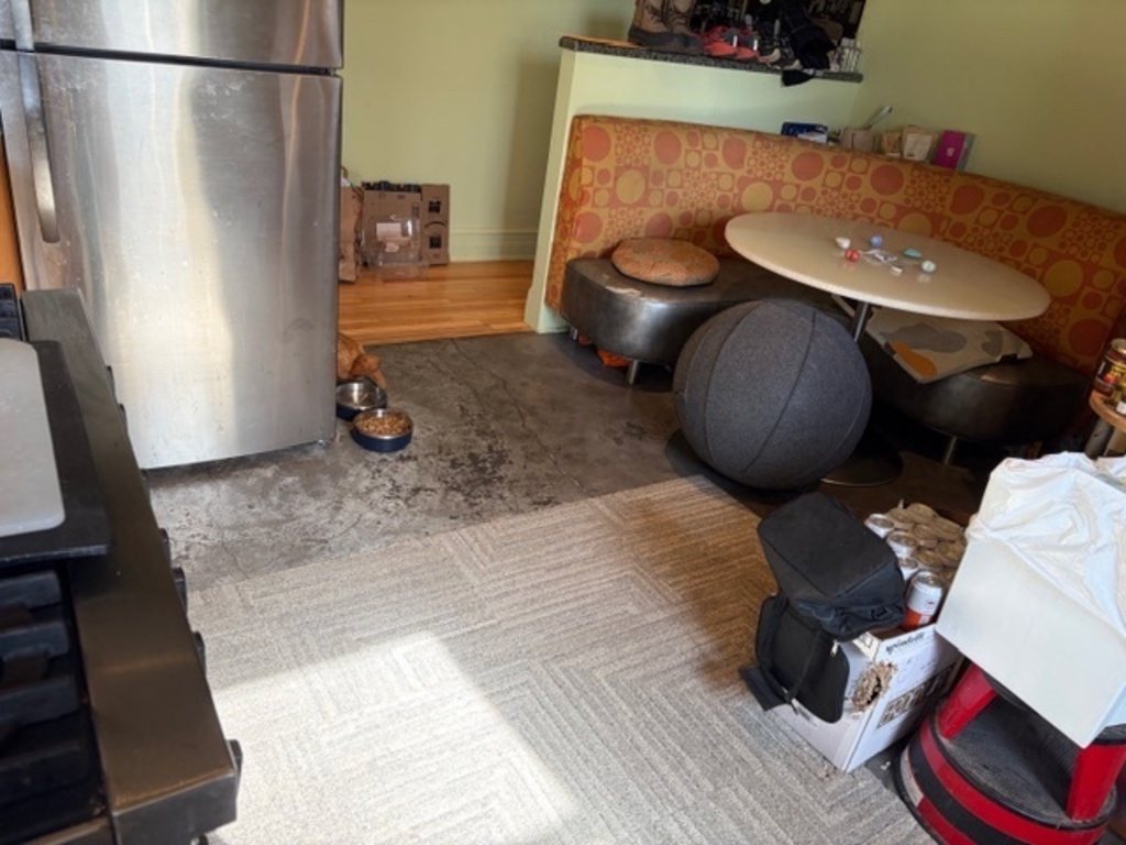 Eat-in kitchen with banquette that comfortably seats 4.