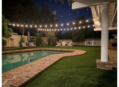 This view from your flat entry shows the area for your use, firepit, pool, hot tub, outdoor kitchen. Nice for evenings