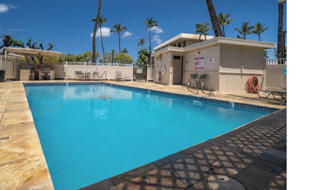 Closest unit to the pool and BBQ area. Plenty of lounge chairs and a bathroom