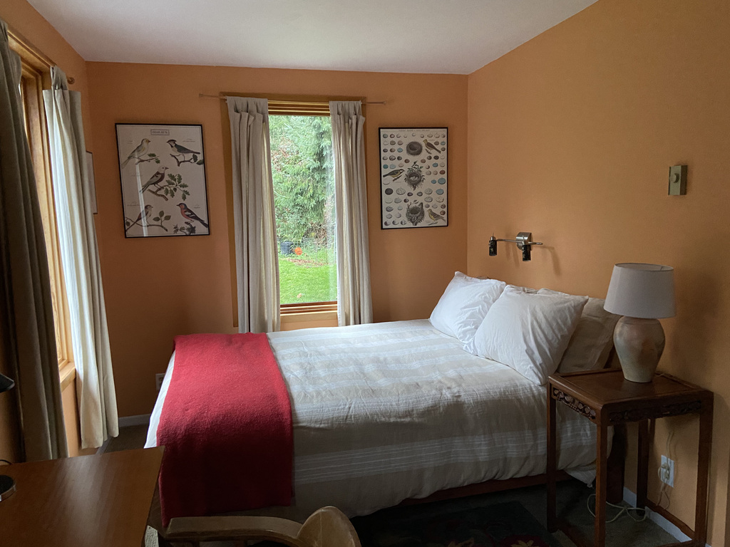 The upstairs bedroom with a queen bed. 