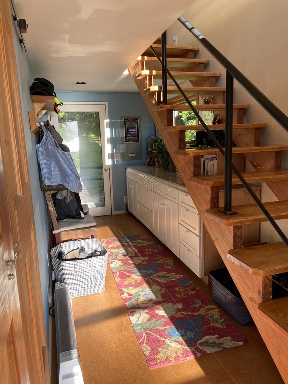 This is the entryway with stairs to the upstairs. 