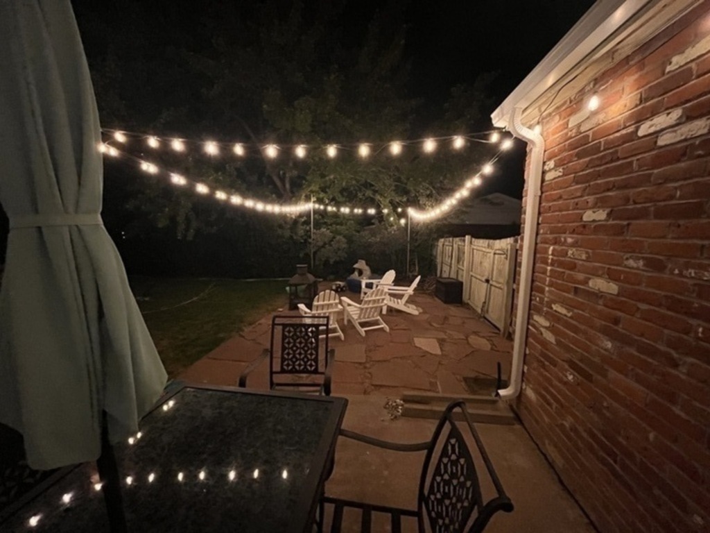 Stone patio with wood firepit