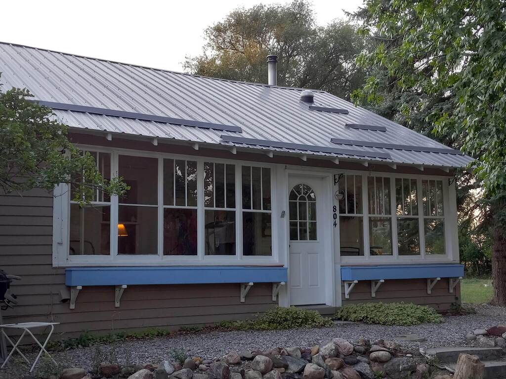 East entry with spacious sun porch