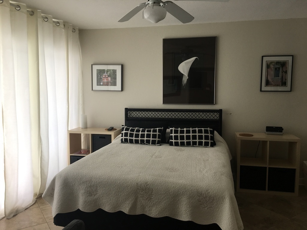 The "master suite," downstairs. Full bath with shower and walk in closet.